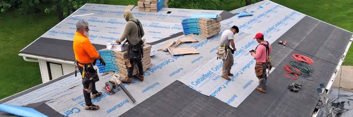 Roofing crew installing underlayment and shingles, illustrating roofing terms Minnesota by Wright at Home Roofing & Exteriors in Minnesota