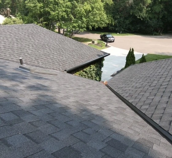 Newly installed roof with gray CertainTeed Landmark shingles installed by a residential roofing contractor in Minneapolis, MN