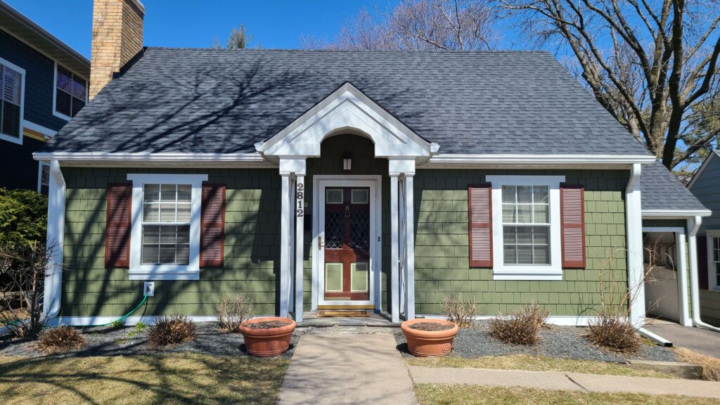 Home with James Hardie shingle siding in Mountain Sage and CertainTeed Moire Black roof by Wright at Home Roofing & Exteriors in Minneapolis