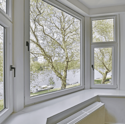 White-framed bay window by Marvin Window Replacement atWright at Home Roofing & Exteriors Minneapolis, MN.