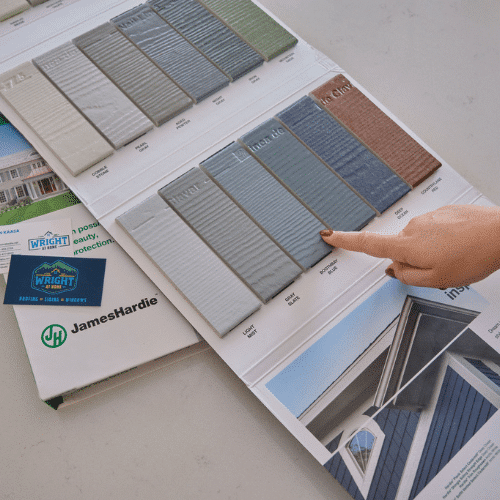 Wright at Home Roofing & Exteriors customer choosing a siding option in Minneapolis, MN