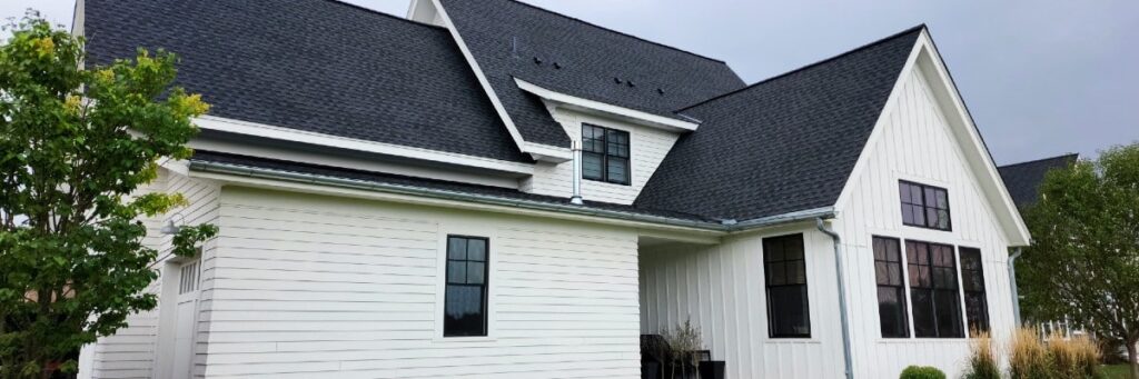 Lake Elmo home with a newly installed Timberline HDZ shingle roof by Wright at Home Roofing.