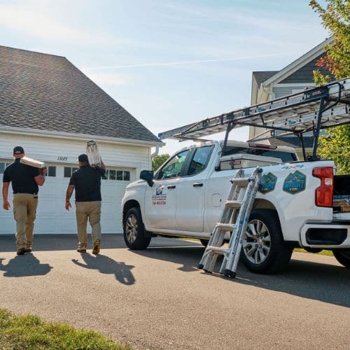 Wright at Home Roofing & Exteriors crew with James Hardie products and company truck in Minneapolis, MN