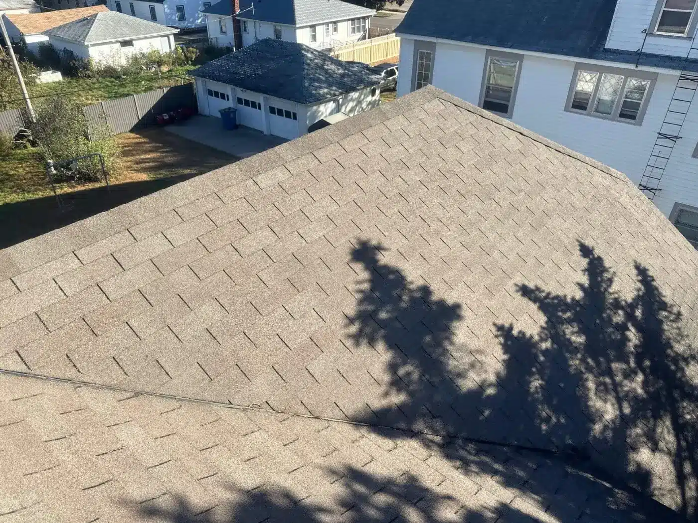 Newly installed CertainTeed Landmark shingles in Weathered Wood by Dolan Roofing & Construction in Robbinsdale, MN