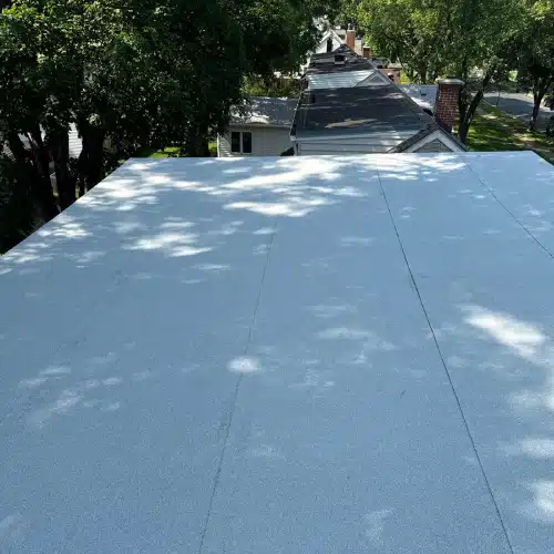 Flat roofing surface showing clean installation and material texture by Wright at Home Roofing & Exteriors in Minnesota
