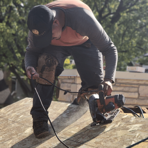 Roof installation crew replacing shingles on a Minneapolis roof by Wright at Home Roofing & Exteriors
