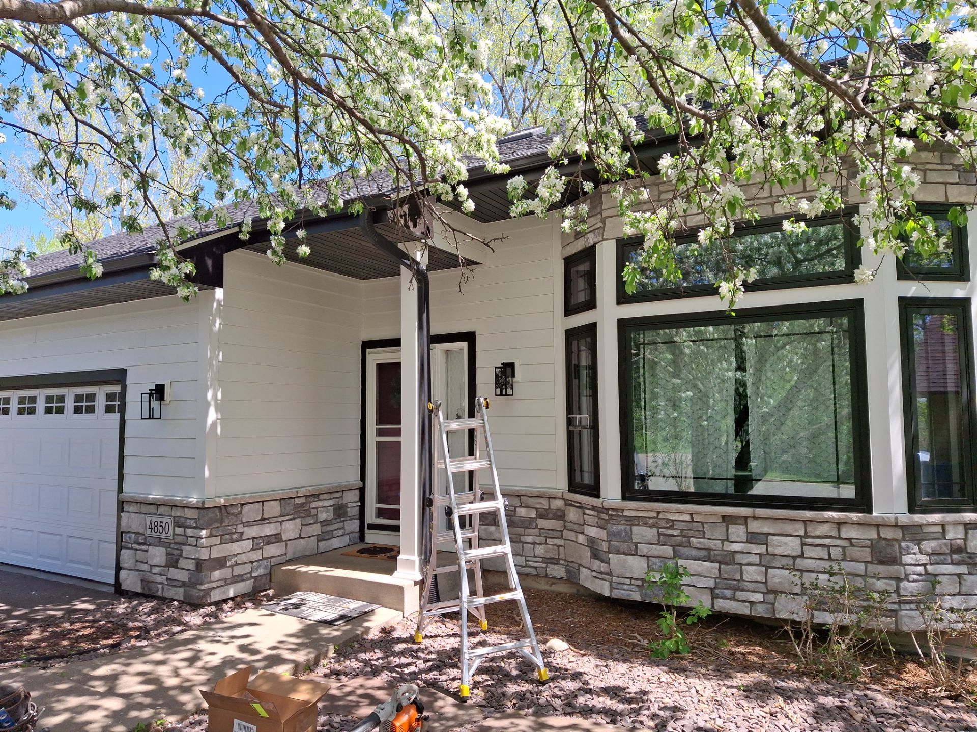 Roof replacement and siding renovation by Wright at Home Roofing & Exteriors in Maple Grove