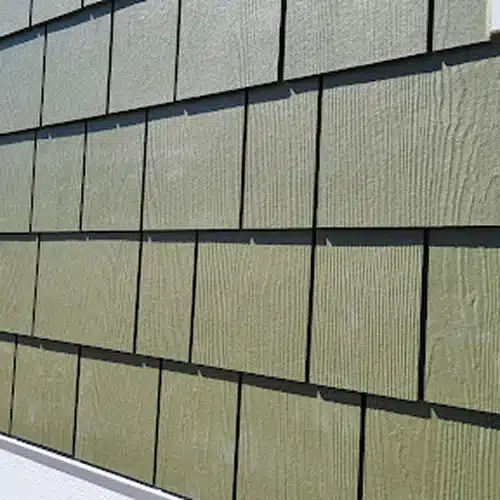 Close-up of weather-resistant siding panels installed by Wright at Home Roofing & Exteriors in Arden Hills