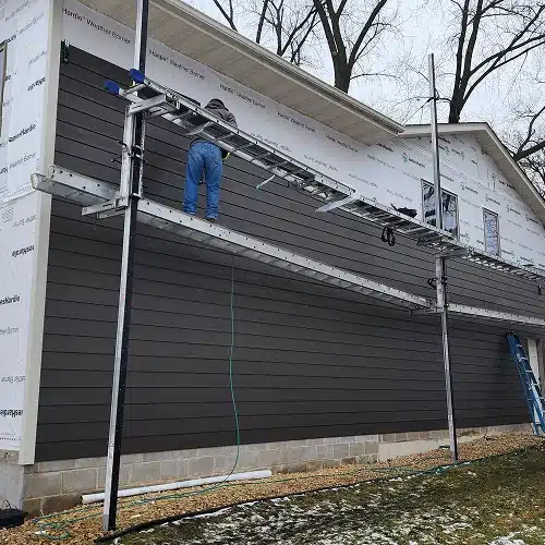 Professional siding installation showing project cost factors by Wright at Home Roofing & Exteriors in MN