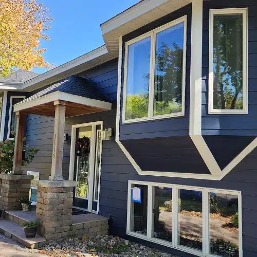 Stillwater MN exterior restoration highlighting James Hardie siding and entryway remodeling by Wright at Home Roofing & Exteriors in MN