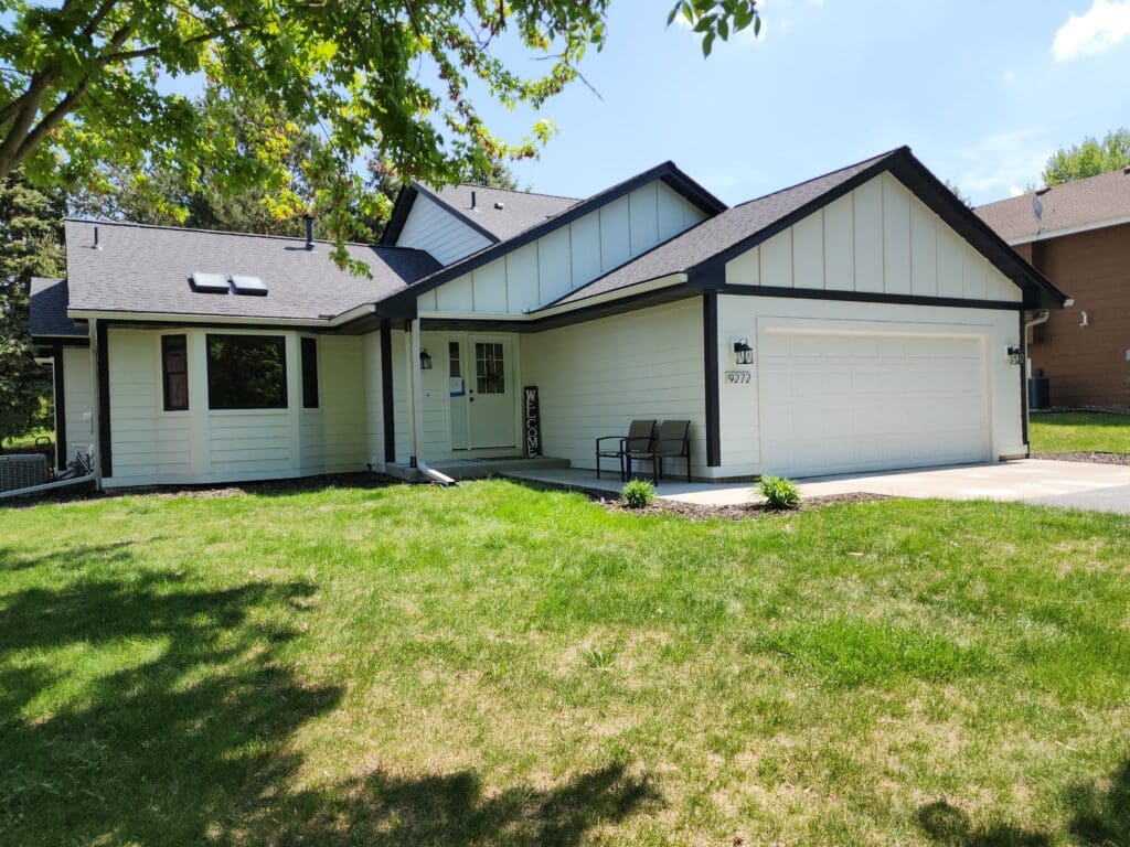 Modern monochrome transformation exterior service in Blaine, MN by Wright at Home Roofing & Exteriors