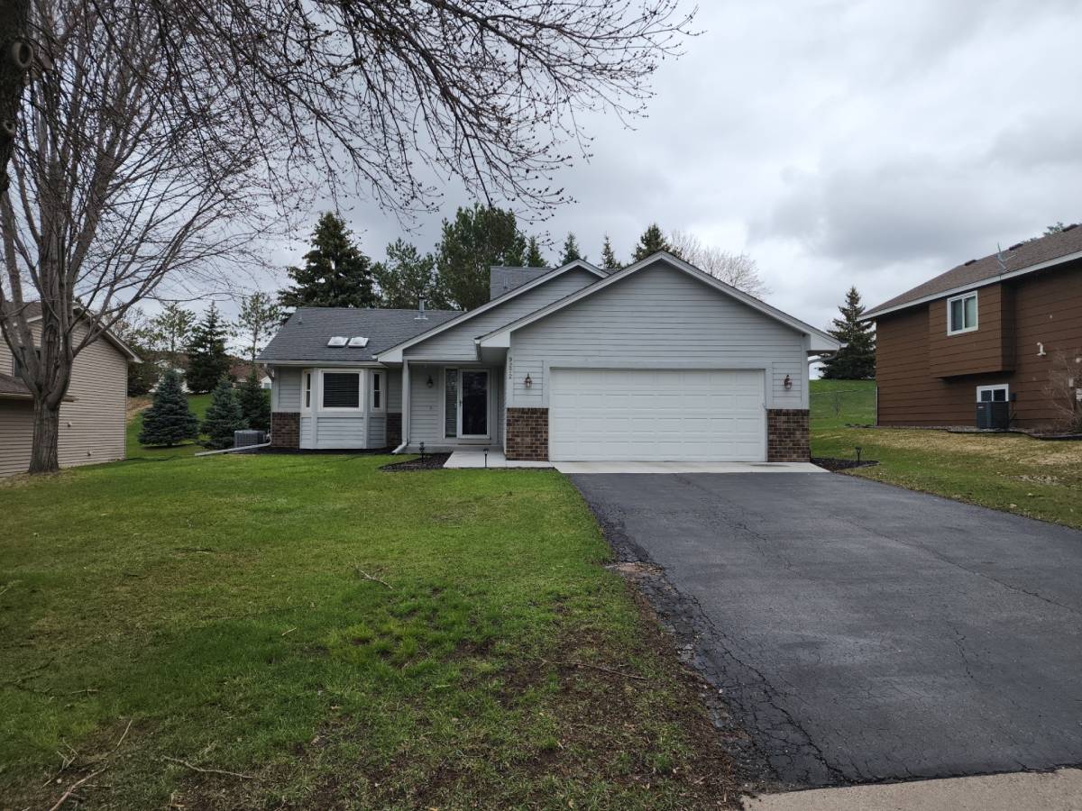Completed modern monochrome transformation siding service in Blaine, MN by Wright at Home Roofing & Exteriors