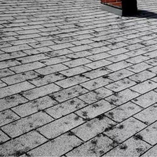 Hail-damaged asphalt shingles, best roofing materials for Minnesota storm damage repair in Blaine, MN by Wright at Home Roofing & Exteriors