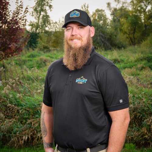Patrick Lokker staff portrait in branded apparel, roofing and exteriors project manager in the Twin Cities by Wright at Home Roofing & Exteriors